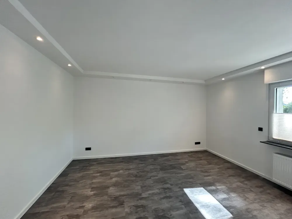 Stilvolle 3-Zimmer-Wohnung mit Gartenanteil, Erstbezug nach Kernsanierung