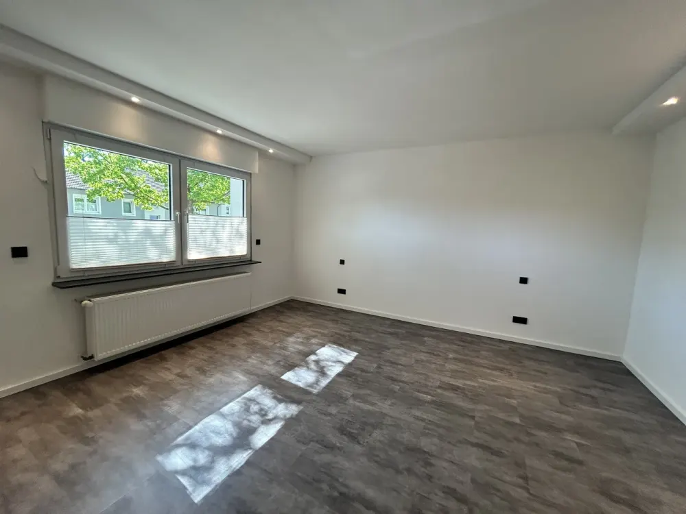 Stilvolle 3-Zimmer-Wohnung mit Gartenanteil, Erstbezug nach Kernsanierung