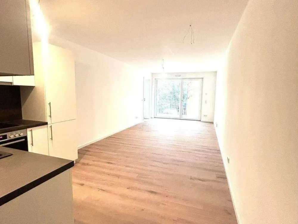 *2 MONATE MIETFREI* Erstbezug 2-Zimmer-Wohnung Balkon überdacht | EBK | Abstellraum | TG