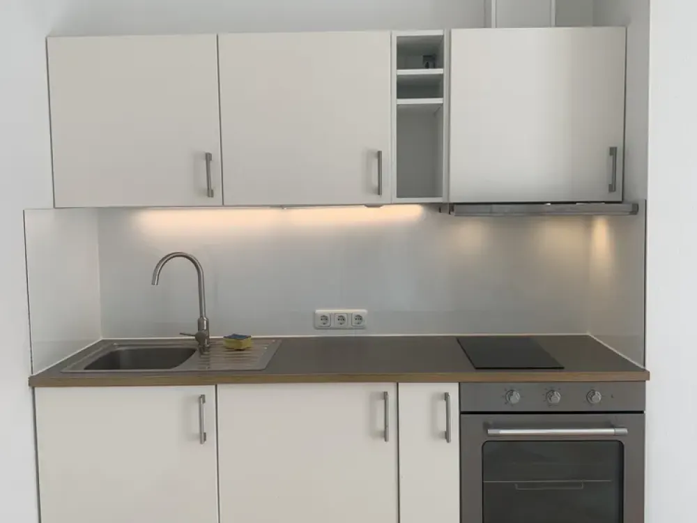 Moderne 2,5-Zimmer-Souterrainwohnung mit hochwertiger Einbauküche und sonniger Terrasse