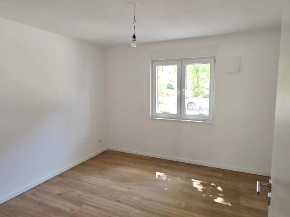 Erdgeschosswohnung mit Einbauküche und Garten