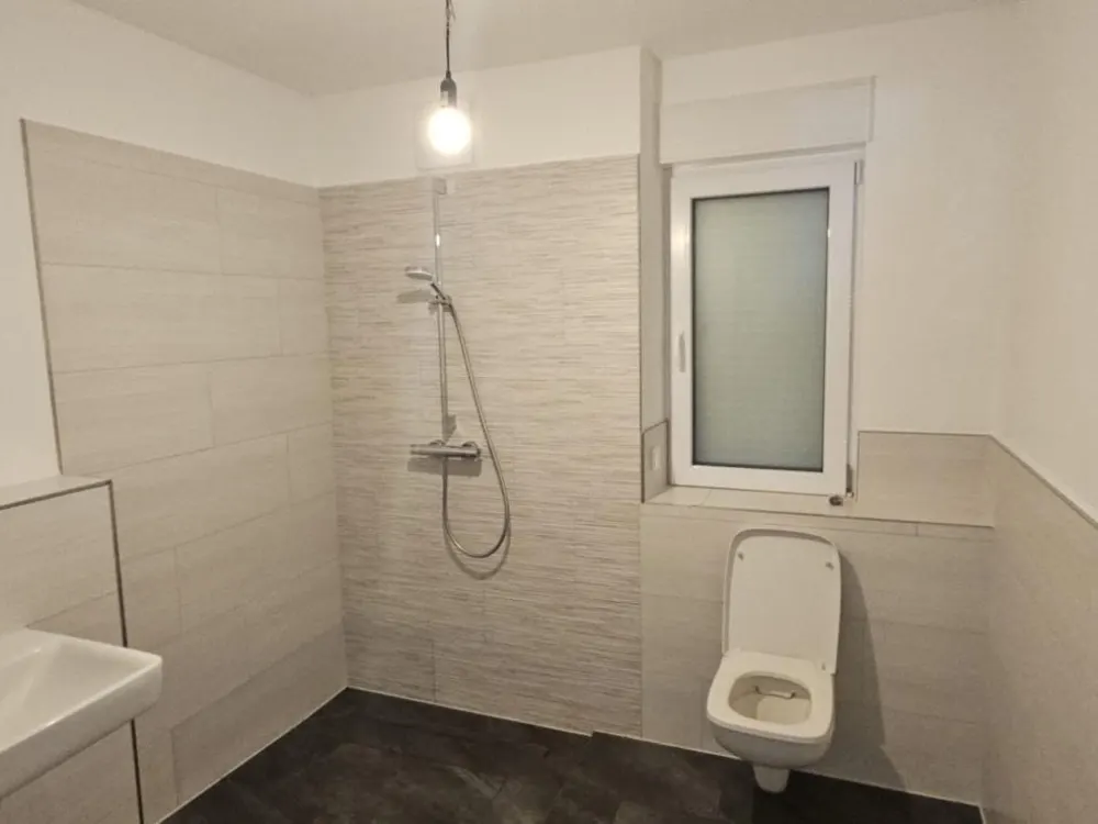 Erdgeschosswohnung mit Einbauküche und Garten