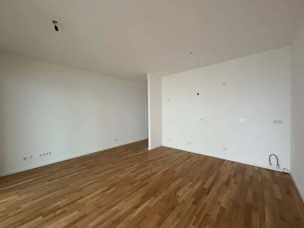 Neuwertige 3-Zimmer-Wohnung mit Balkon und EBK, STP mit Wallbox in Düsseldorf-Heerdt