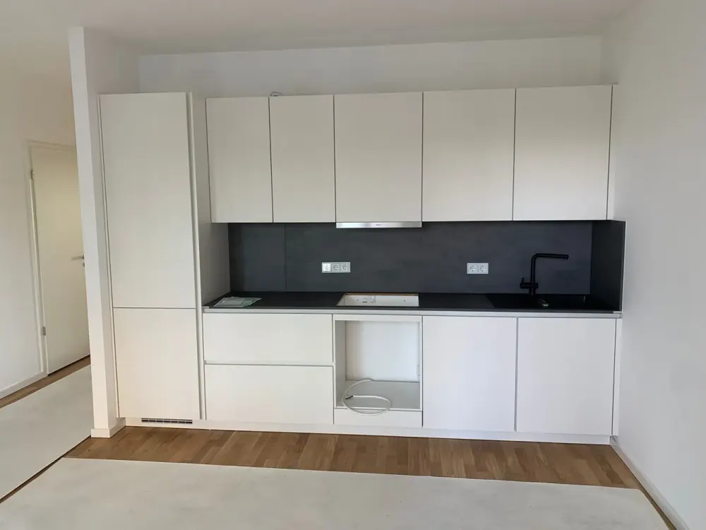 Neuwertige 3-Zimmer-Wohnung mit Balkon und EBK, STP mit Wallbox in Düsseldorf-Heerdt