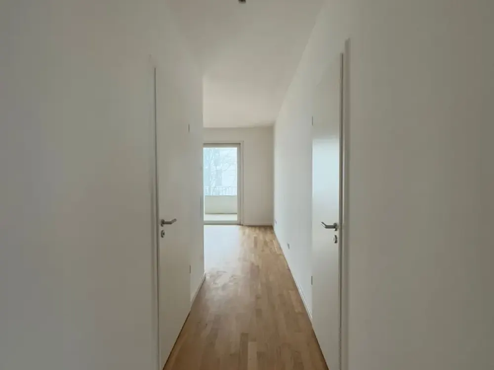 Neuwertige 3-Zimmer-Wohnung mit Balkon und EBK, STP mit Wallbox in Düsseldorf-Heerdt