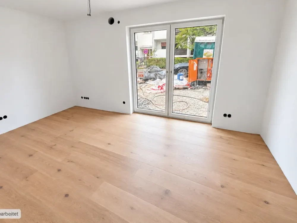 AIGNER - Neubau Erstbezug: 4-Zimmer-Erdgeschosswohnung mit Garten in Solln!