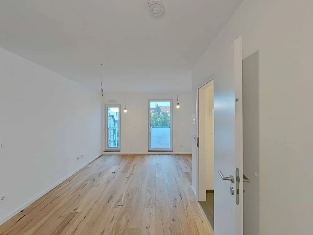 Erstbezug im 4. OG mit 49 m² Dachterrasse, Küche inklusive