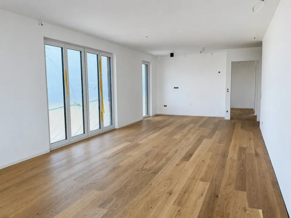 3-Zimmer-Neubauwohnung, Erstbezug, Balkon, Aufzug, Tiefgarage, Geothermie-Wärmepumpe und Kühlung