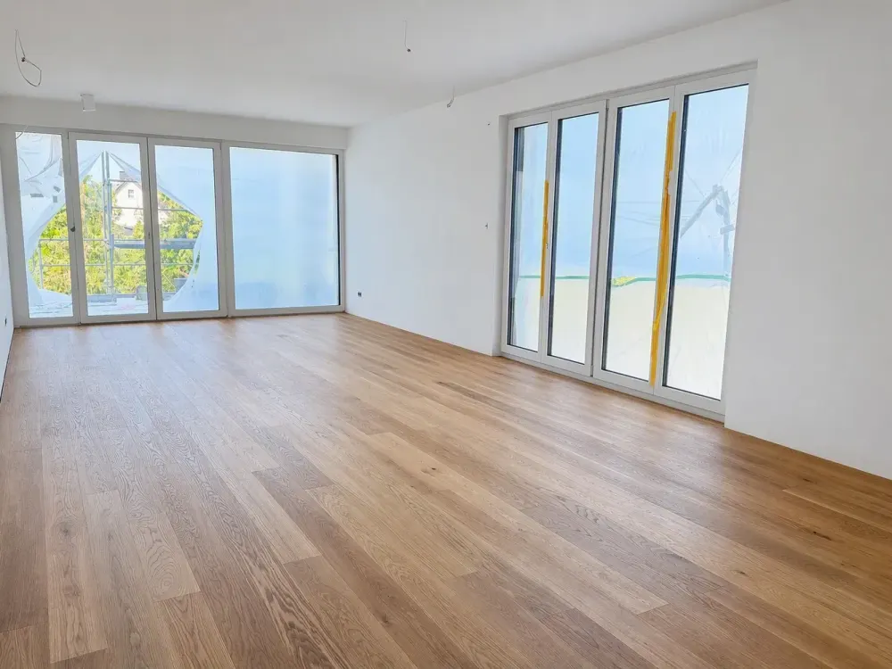 3-Zimmer-Neubauwohnung, Erstbezug, Balkon, Aufzug, Tiefgarage, Geothermie-Wärmepumpe und Kühlung