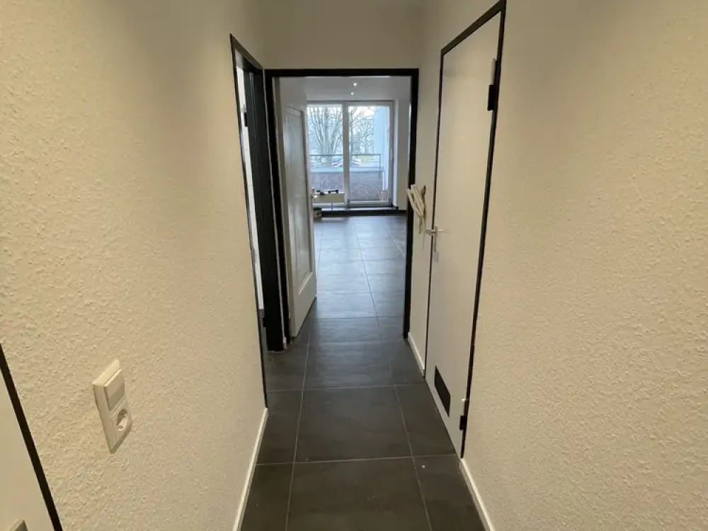2-Zimmer Wohnung mit PKW-Stellplatz und Süd-Balkon