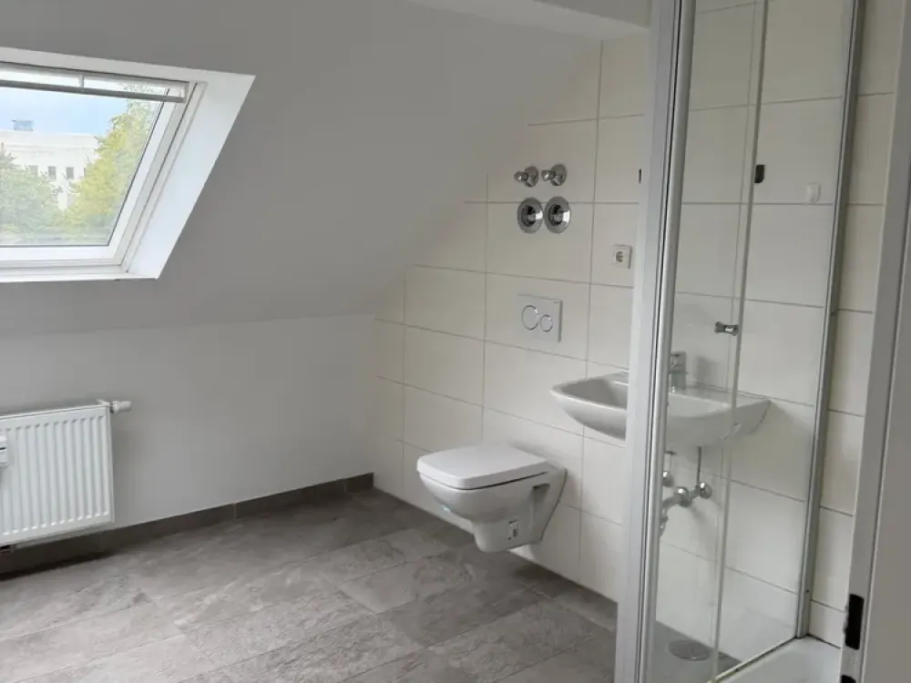 Lots of space in this 3-room attic apartment (with air conditioning) in Haan in the middle of greenery!