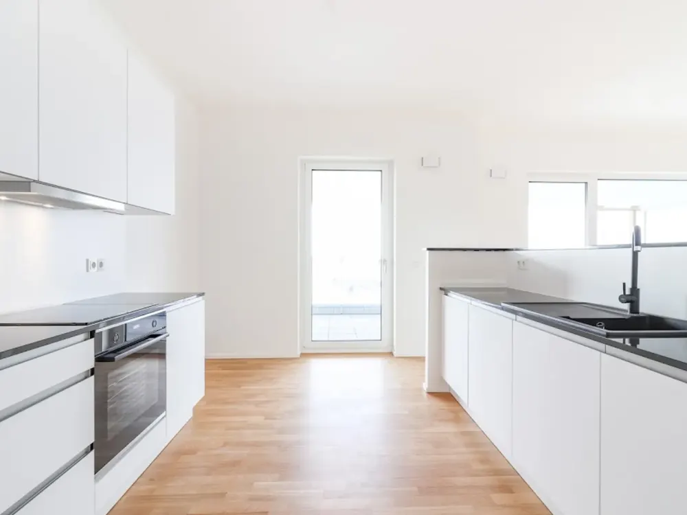 Exklusive Penthouse-Oase mit sonnigem Balkon und moderner Einbauküche