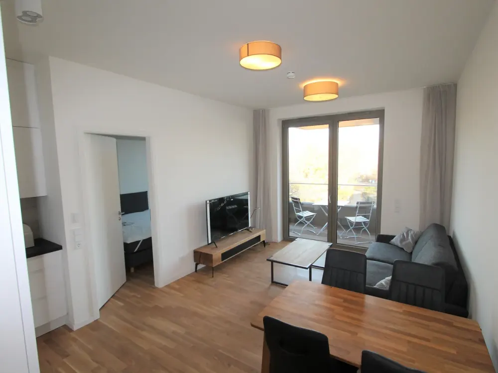 STILVOLL MÖBLIERTE 2-ZI NEUBAUWOHNUNG IM 4.OG MIT AUFZUG & BALKON