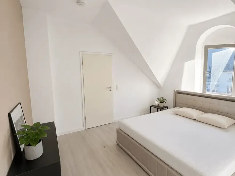Großzügige Dachgeschosswohnung am Stadtgarten