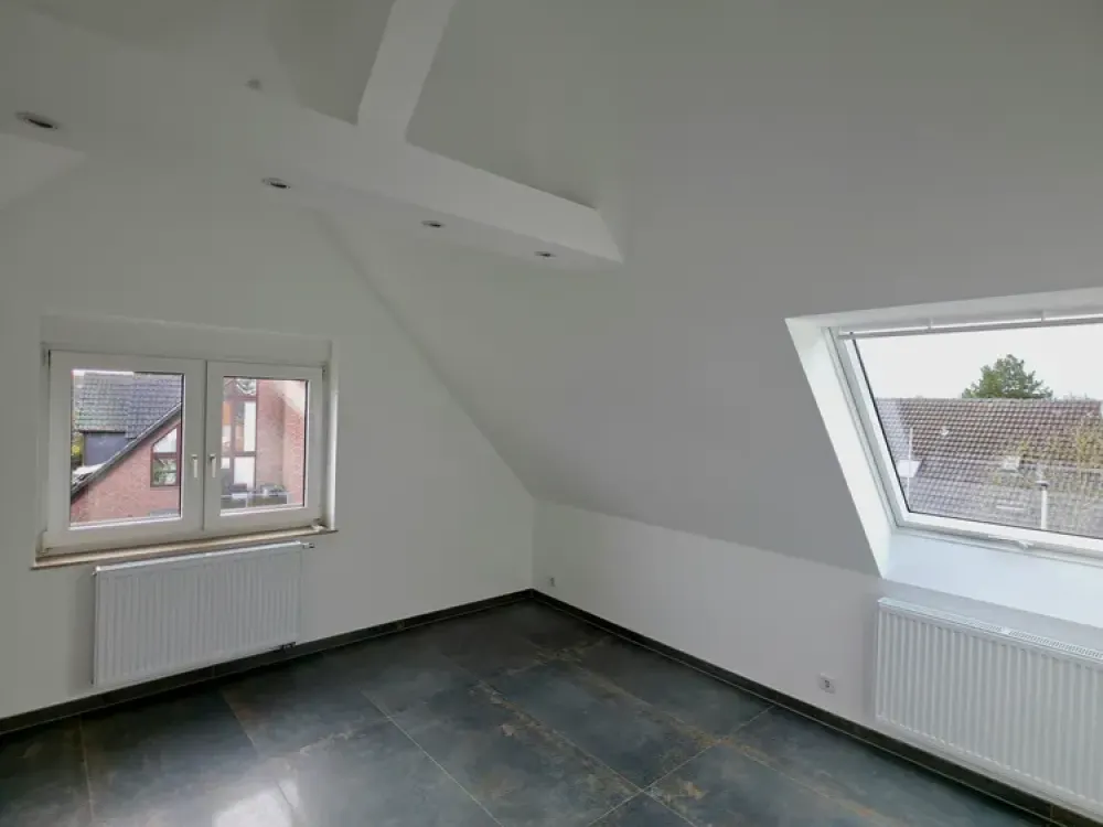 Elegante Dachgeschosswohnung im Herzen von Kaarst