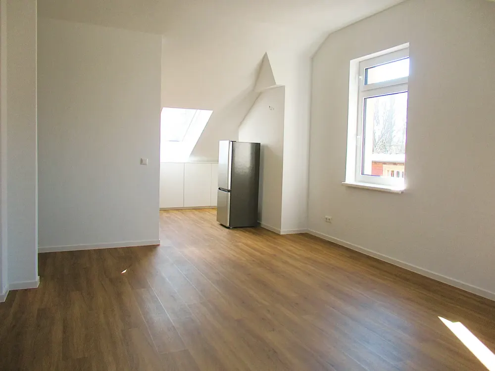 Wohnen im Grünen - Schöne 2-Zimmer-DG-Wohnung mit EBK