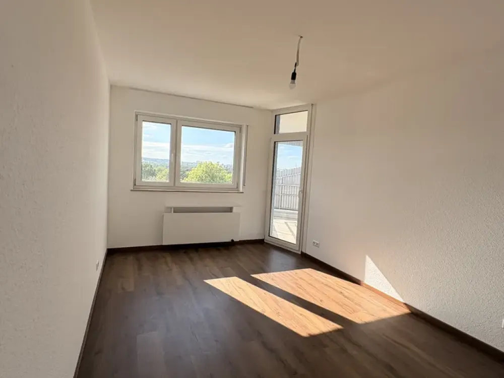 Erstbezug nach Modernisierung: Stilvolle 3-Zimmer-Wohnung mit Traumblick & Garage im ikonischen Haus