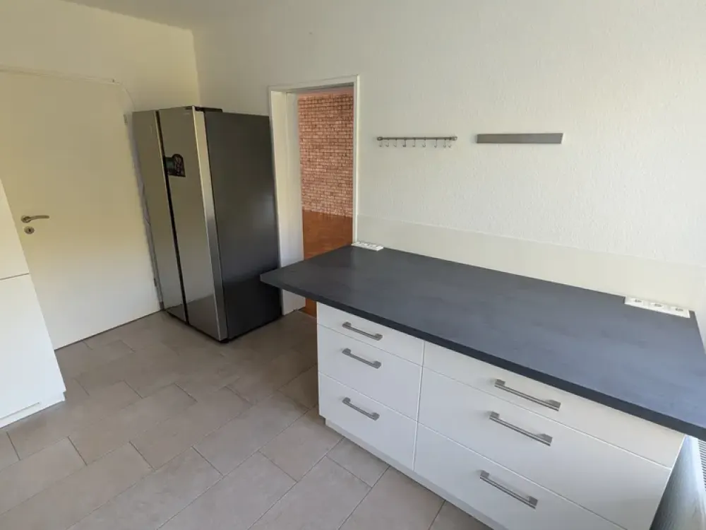 3-Zimmer-Wohnung mit eigenem Garten und Garage