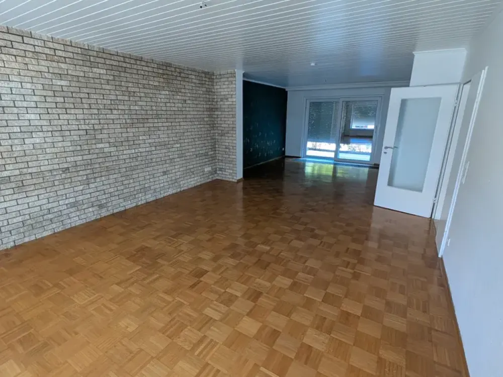 3-Zimmer-Wohnung mit eigenem Garten und Garage