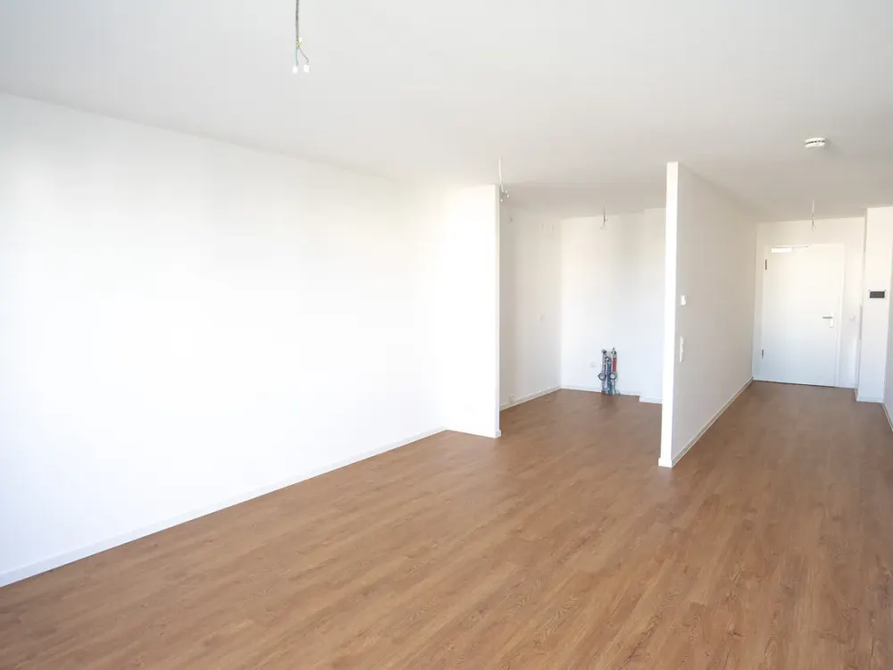 Erstbezug: 2 Zimmer mit Einbauküche, großem Balkon & Tiefgarage