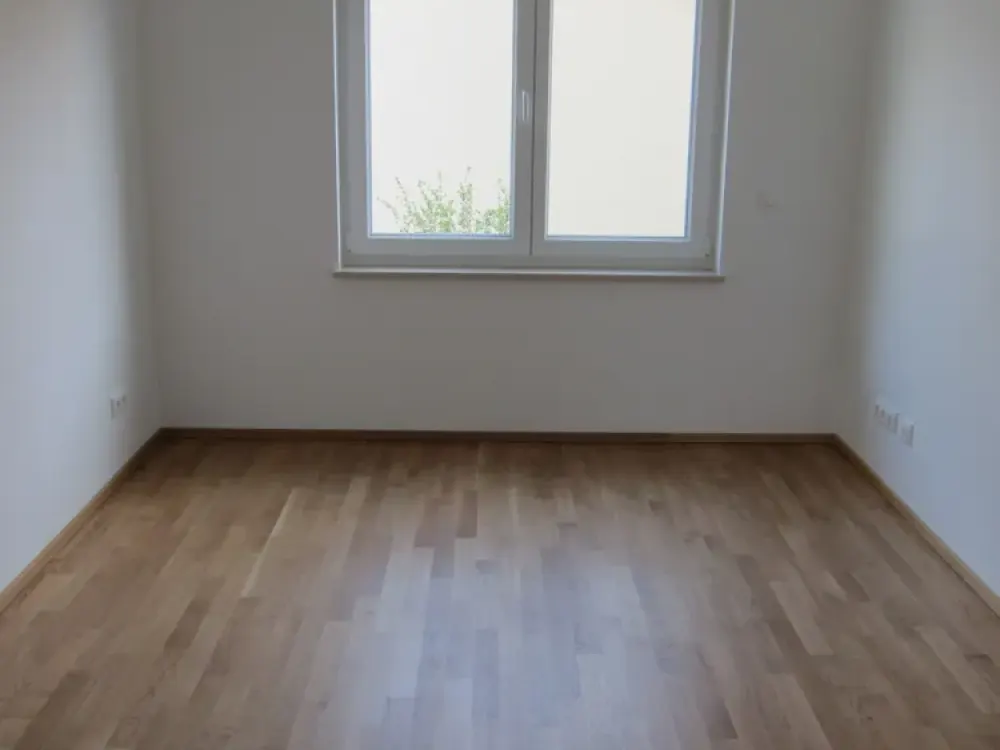 3-Zimmer- Wohnung im EG mit Terrasse und Gartenteil in Unterhaching