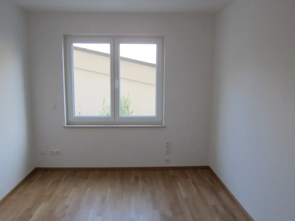 3-Zimmer- Wohnung im EG mit Terrasse und Gartenteil in Unterhaching