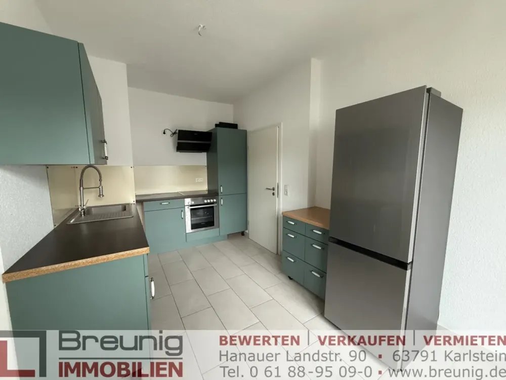 Moderne 3-Zi.-Wohnung mit Terrasse, EBK & Garage im Stadtzentrum