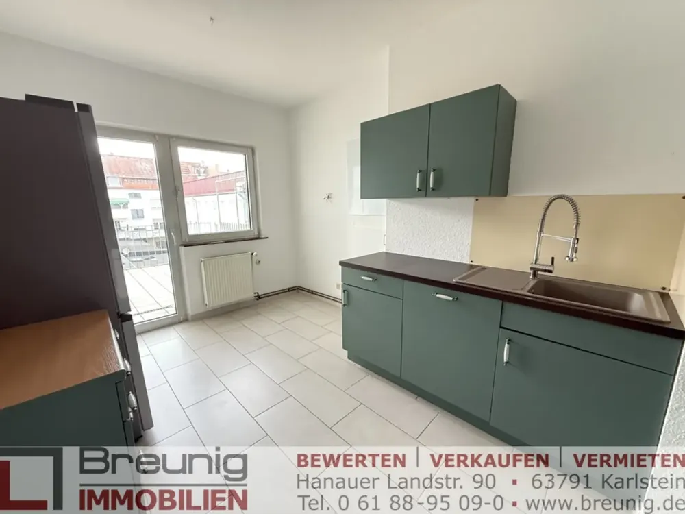 Moderne 3-Zi.-Wohnung mit Terrasse, EBK & Garage im Stadtzentrum