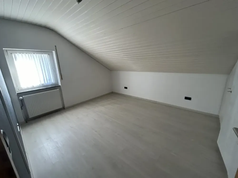 Charming 3-Room Attic Apartment with Spacious Living Area and Wonderful Distant View