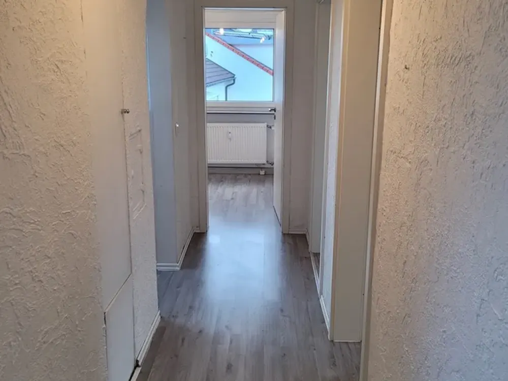 Gemütliche Dachgeschoss-Wohnung in idealer Lage für Singles und Paare!