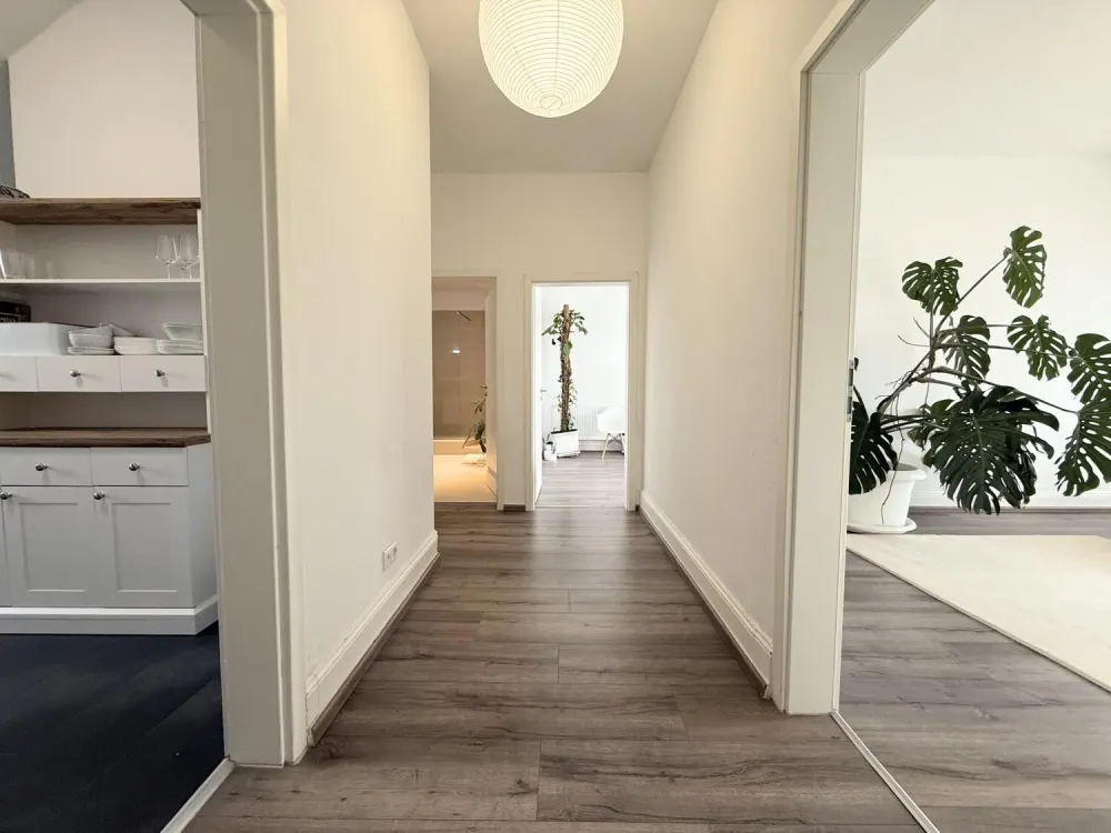 Geschmackvoll möblierte Dachgeschosswohnung mit besonderem Altbauflair