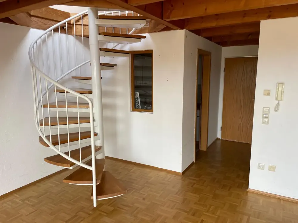 Above the Roofs of Dietlingen: Cozy 2-Room Maisonette with Panoramic Balcony & Parking Space