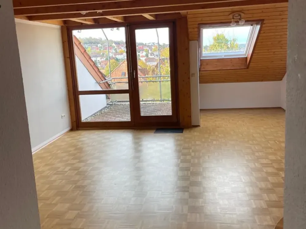 Above the Roofs of Dietlingen: Cozy 2-Room Maisonette with Panoramic Balcony & Parking Space
