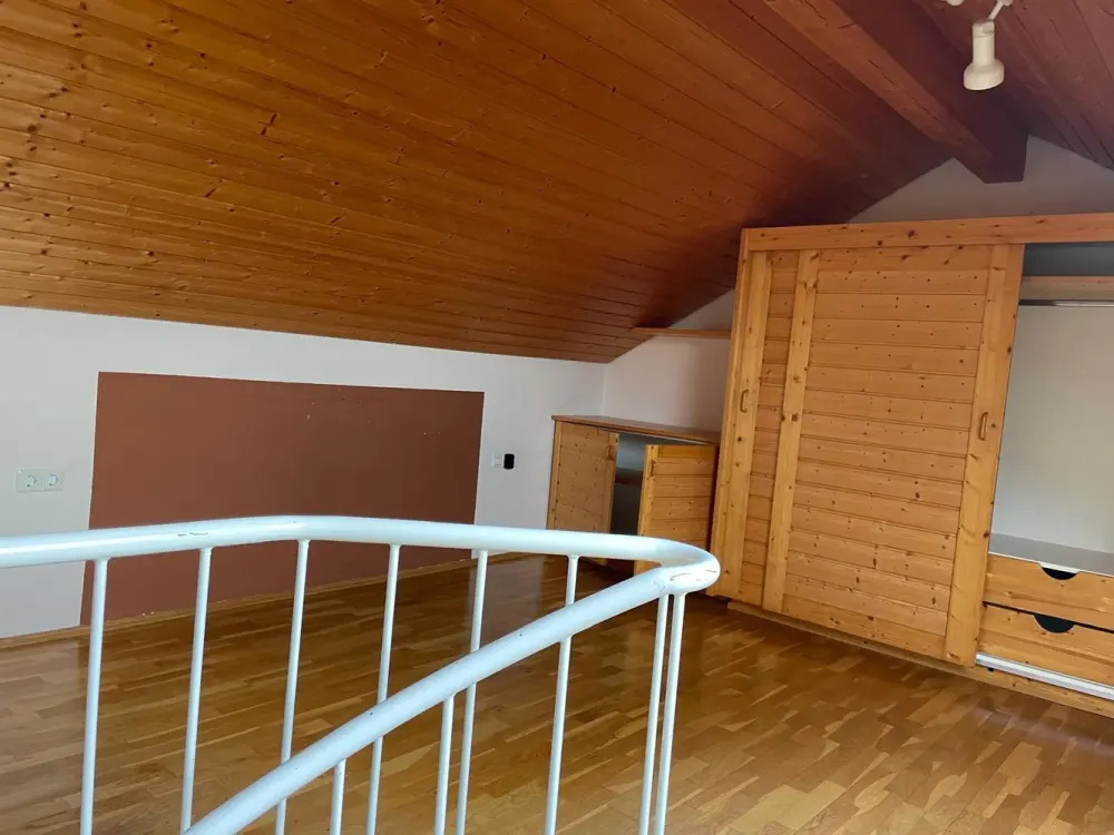 Above the Roofs of Dietlingen: Cozy 2-Room Maisonette with Panoramic Balcony & Parking Space