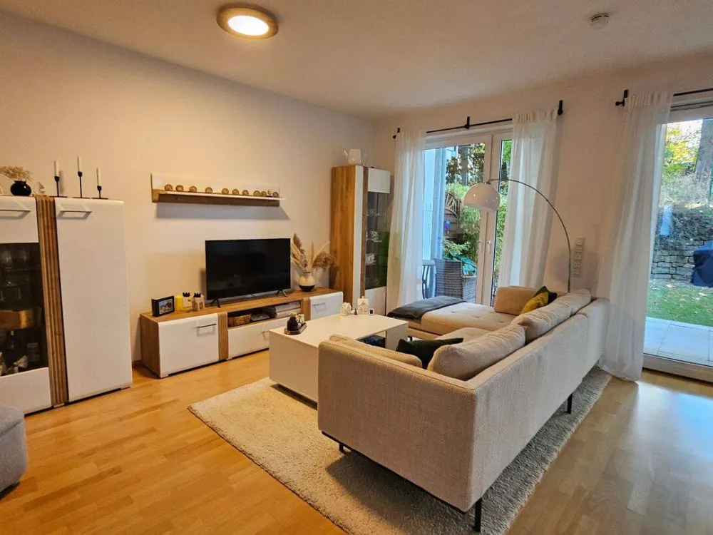 Top-Wohnung mit Terrasse und Garten in Bestlage Triller