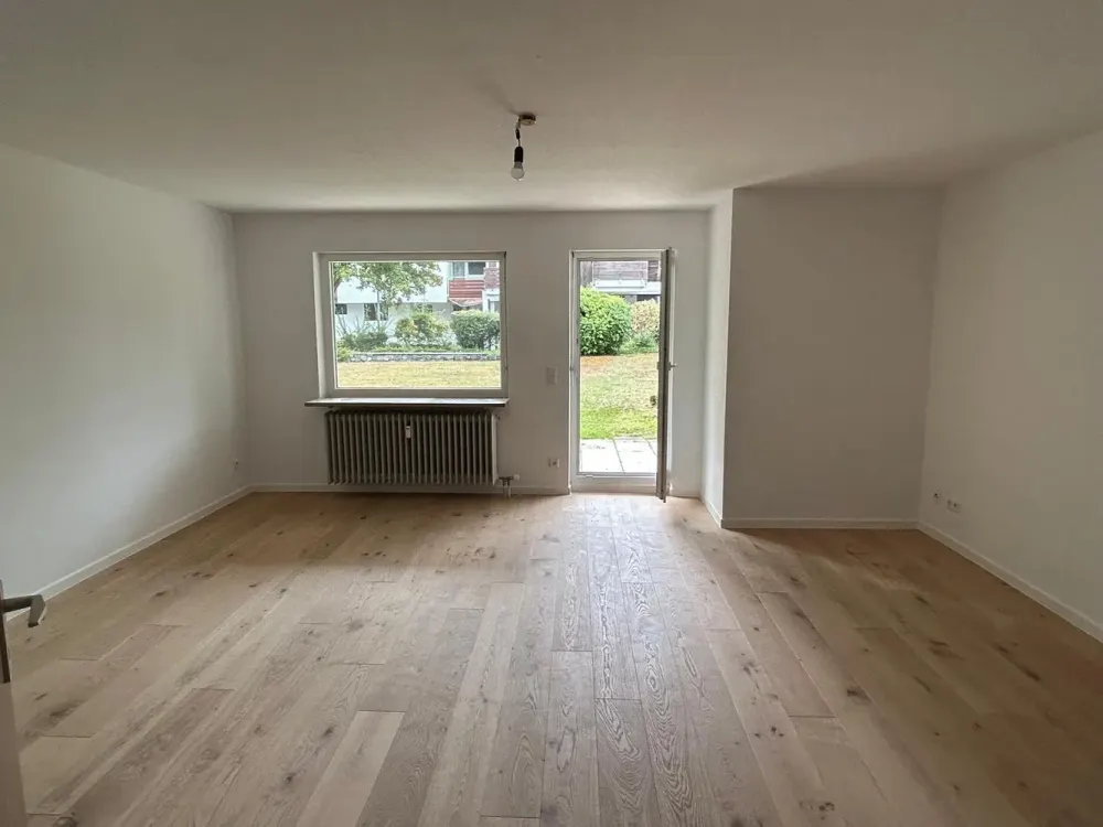 Renovierte, helle 3-Zi-Whg mit großzügiger Terrasse und kleinem Gartenanteil