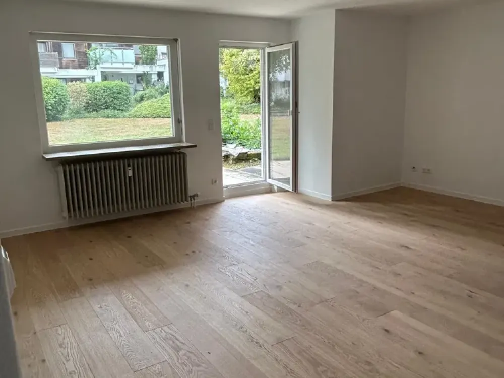 Renovierte, helle 3-Zi-Whg mit großzügiger Terrasse und kleinem Gartenanteil