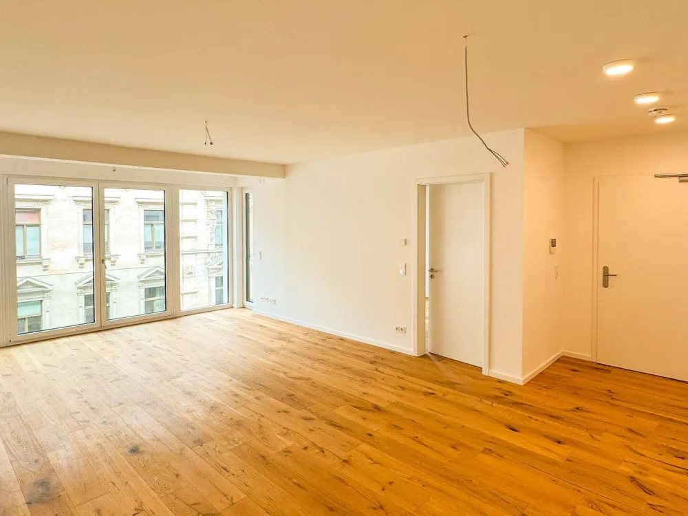 2-Zimmer-Wohnung in begehrter Adresse l Neubau l Tiefgarage l Aufzug