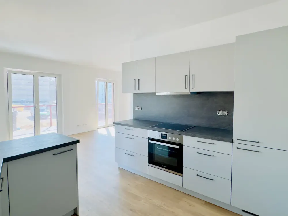 Neubau-Gebiet Hannover KRONSRODE: Einbauküche, Süd-Balkon, Fußbdnhzg, 2 Bäder, HWR, Lift, TG, Keller
