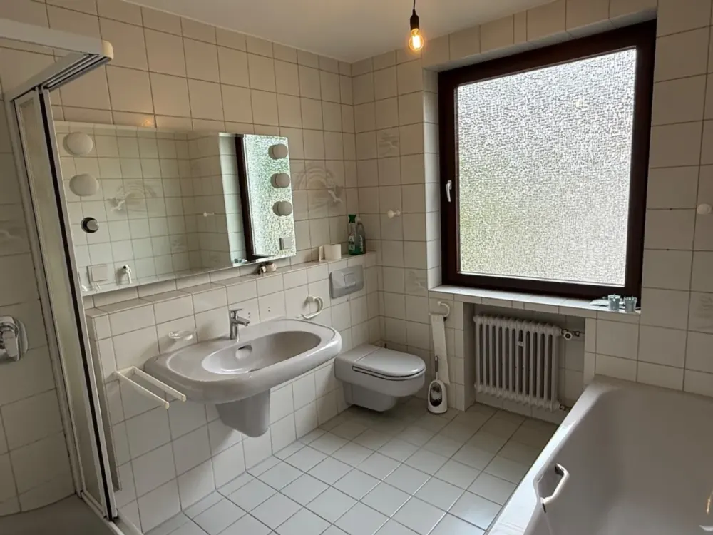 Terrassenwohnung im 2-Familienhaus