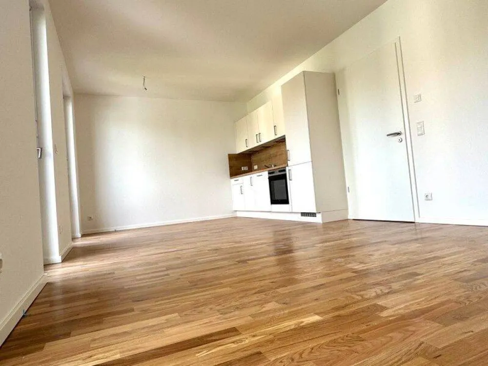 *Erstbezug*: Hochwertiger Neubau - 2-Zimmer-Wohnung mit moderner Einbauküche und großem Balkon