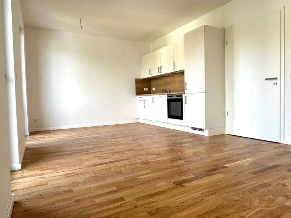 *Erstbezug*: Hochwertiger Neubau - 2-Zimmer-Wohnung mit moderner Einbauküche und großem Balkon