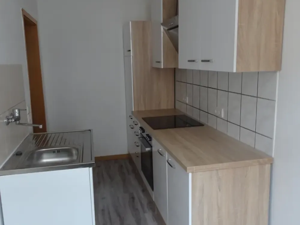 Like-new 2-room apartment with new fitted kitchen in Leipzig, partially furnished