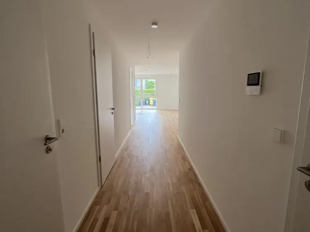 Moderne 2-Zimmer-Neubauwohnung mit Terrasse und Garten