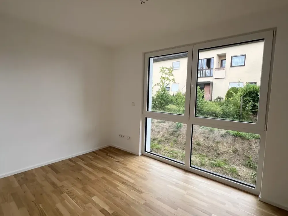 Moderne 2-Zimmer-Neubauwohnung mit Terrasse und Garten