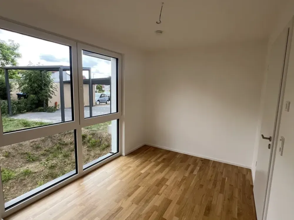 Moderne 2-Zimmer-Neubauwohnung mit Terrasse und Garten