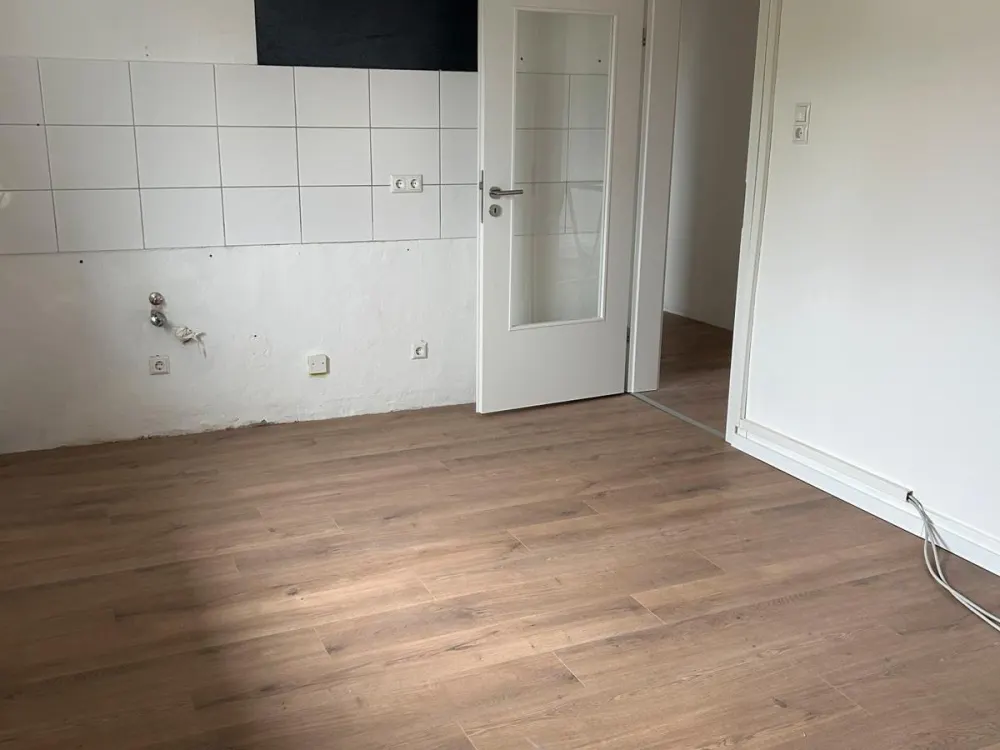 Helle 2-Zimmer-Dachgeschosswohnung im Dreiparteienhaus