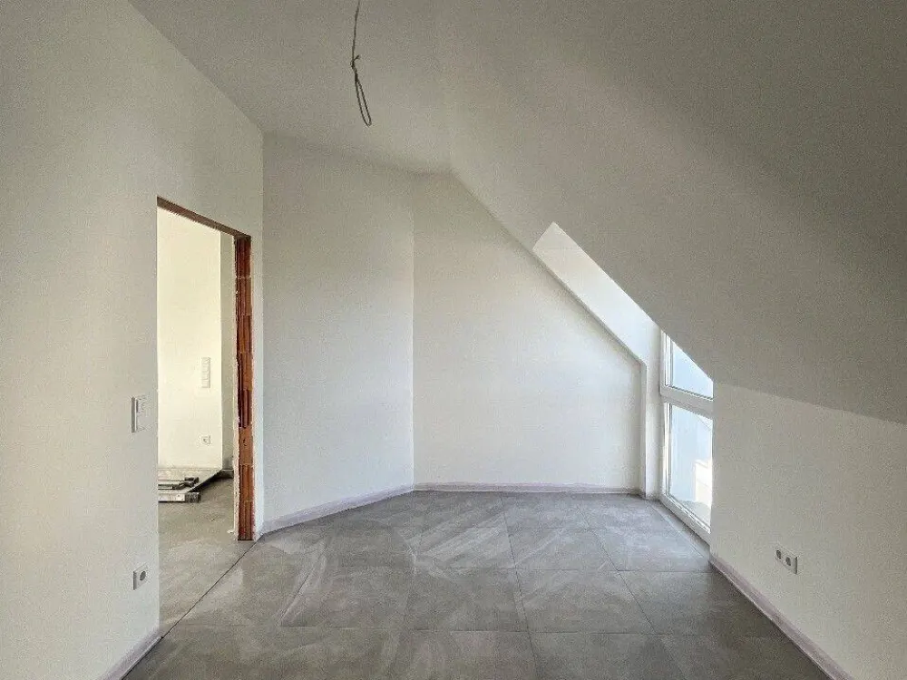 Großzügige 3-Zimmer-Wohnung im DG im KFW 40 QNG Standard