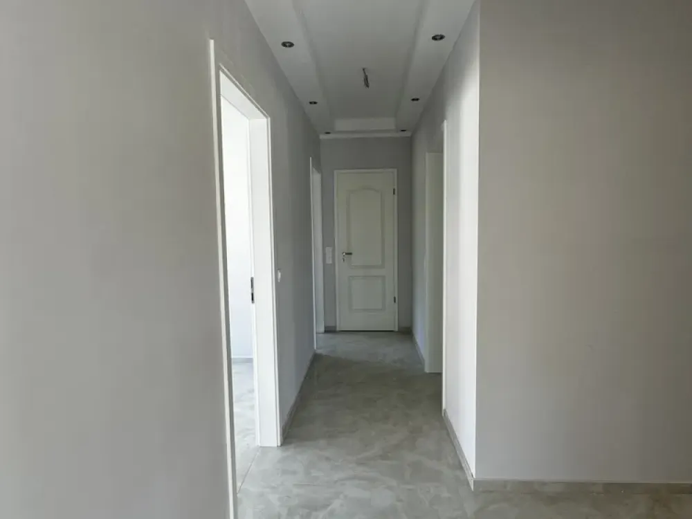 Stilvolle Neubauwohnung mit eigener Terrasse in einem Zweifamilienhaus