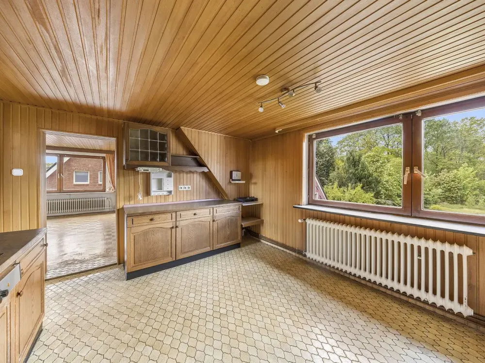 Gemütliche DG-Wohnung in gepflegter Doppelhaushälfte mit Blick ins Grüne